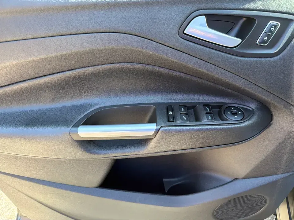 2016 Ford Escape SE (1FMCU0G77GU) with an 2.5L L4 DOHC 16V engine, 6-Speed Automatic transmission, located at 4508 South Dixie Dr, Moraine, OH, 45439, (937) 908-9800, 39.689976, -84.218452 - Whether you're commuting up and down South Dixie Drive, running errands between Moraine and Dayton, or packing up for a weekend getaway, this 2016 Ford Escape SE is the kind of practical SUV that fits real life. It's easy to park, comfortable for daily driving, and versatile enough for everything fr - Photo#19