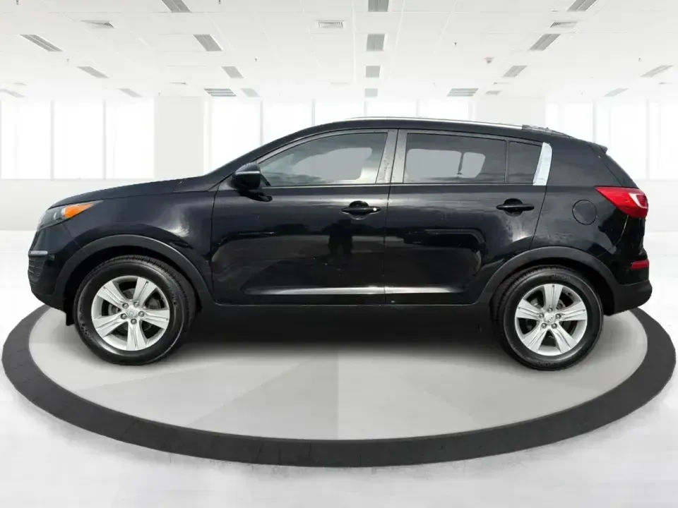 2011 Kia Sportage LX (KNDPB3A25B7) with an 2.4L I-4 DOHC engine, located at 1099 N County Rd 25A, Troy, OH, 45373, (937) 908-9800, 40.057079, -84.212883 - Weekend plans, school drop-offs, and the daily commute all get easier when you have a compact SUV that's comfortable, versatile, and ready for Ohio weather. This 2011 Kia Sportage LX is the kind of crossover that fits real life in Troy-whether you're loading up groceries after a run through town, me - Photo#5