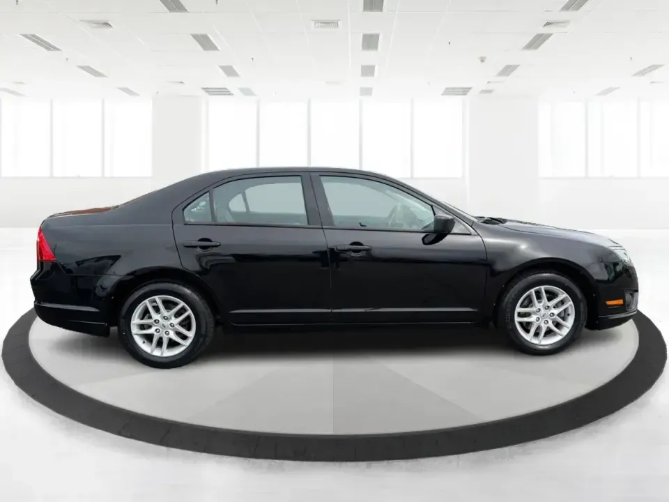 2012 Ford Fusion S (3FAHP0GA3CR) with an 2.5L I-4 DOHC engine, located at 1099 N County Rd 25A, Troy, OH, 45373, (937) 908-9800, 40.057079, -84.212883 - Need a dependable, budget-friendly sedan that can handle the weekday grind and still feel comfortable for weekend errands or a quick road trip to Dayton? This 2012 Ford Fusion S in sleek Tuxedo Black is a smart pick for commuters, first-time buyers, and growing families who want practical transporta - Photo#1