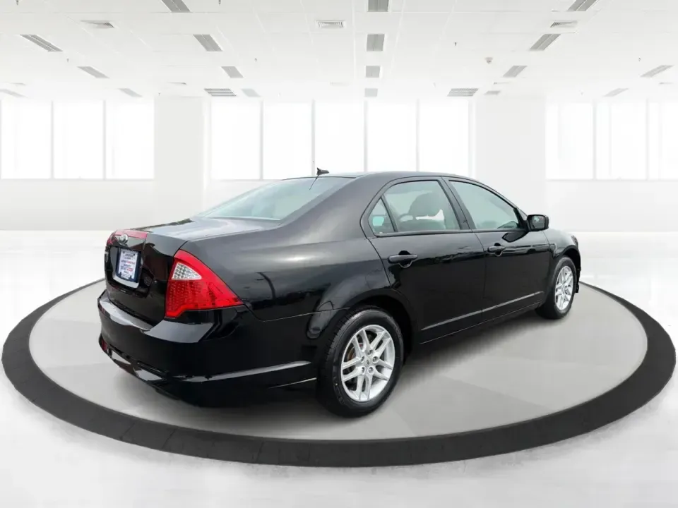 2012 Ford Fusion S (3FAHP0GA3CR) with an 2.5L I-4 DOHC engine, located at 1099 N County Rd 25A, Troy, OH, 45373, (937) 908-9800, 40.057079, -84.212883 - Need a dependable, budget-friendly sedan that can handle the weekday grind and still feel comfortable for weekend errands or a quick road trip to Dayton? This 2012 Ford Fusion S in sleek Tuxedo Black is a smart pick for commuters, first-time buyers, and growing families who want practical transporta - Photo#2