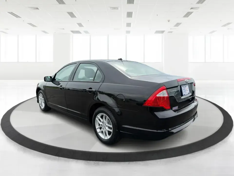 2012 Ford Fusion S (3FAHP0GA3CR) with an 2.5L I-4 DOHC engine, located at 1099 N County Rd 25A, Troy, OH, 45373, (937) 908-9800, 40.057079, -84.212883 - Need a dependable, budget-friendly sedan that can handle the weekday grind and still feel comfortable for weekend errands or a quick road trip to Dayton? This 2012 Ford Fusion S in sleek Tuxedo Black is a smart pick for commuters, first-time buyers, and growing families who want practical transporta - Photo#4