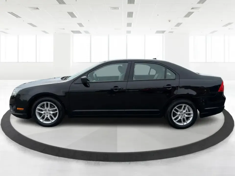 2012 Ford Fusion S (3FAHP0GA3CR) with an 2.5L I-4 DOHC engine, located at 1099 N County Rd 25A, Troy, OH, 45373, (937) 908-9800, 40.057079, -84.212883 - Need a dependable, budget-friendly sedan that can handle the weekday grind and still feel comfortable for weekend errands or a quick road trip to Dayton? This 2012 Ford Fusion S in sleek Tuxedo Black is a smart pick for commuters, first-time buyers, and growing families who want practical transporta - Photo#5