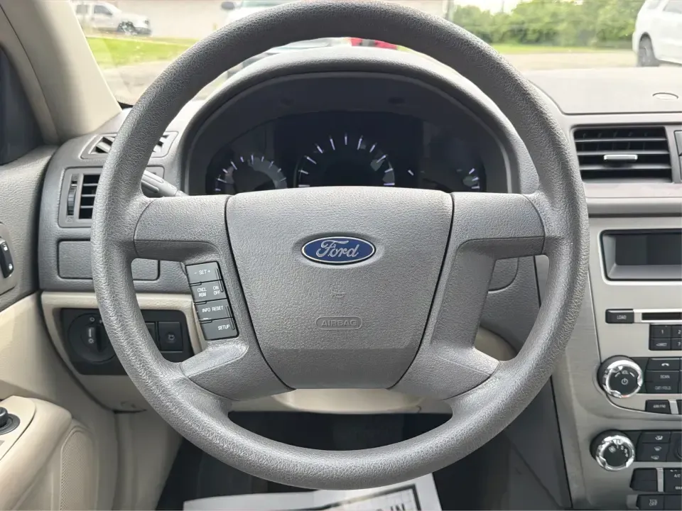 2012 Ford Fusion S (3FAHP0GA3CR) with an 2.5L I-4 DOHC engine, located at 1099 N County Rd 25A, Troy, OH, 45373, (937) 908-9800, 40.057079, -84.212883 - Need a dependable, budget-friendly sedan that can handle the weekday grind and still feel comfortable for weekend errands or a quick road trip to Dayton? This 2012 Ford Fusion S in sleek Tuxedo Black is a smart pick for commuters, first-time buyers, and growing families who want practical transporta - Photo#16