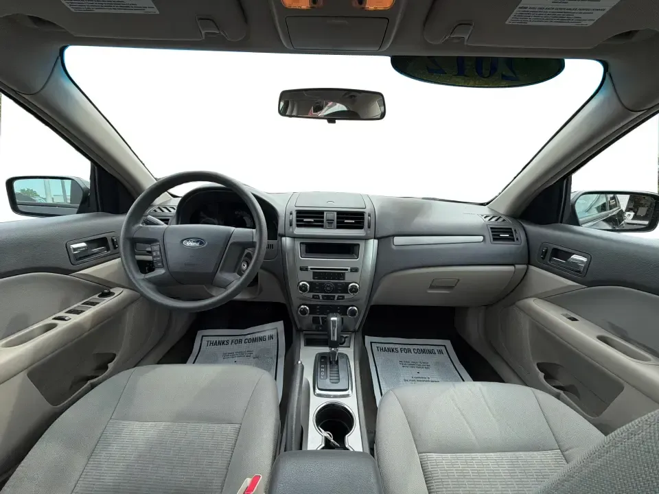 2012 Ford Fusion S (3FAHP0GA3CR) with an 2.5L I-4 DOHC engine, located at 1099 N County Rd 25A, Troy, OH, 45373, (937) 908-9800, 40.057079, -84.212883 - Need a dependable, budget-friendly sedan that can handle the weekday grind and still feel comfortable for weekend errands or a quick road trip to Dayton? This 2012 Ford Fusion S in sleek Tuxedo Black is a smart pick for commuters, first-time buyers, and growing families who want practical transporta - Photo#20
