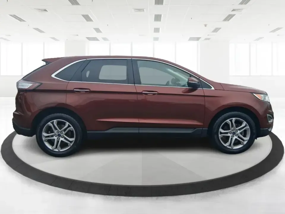 2016 Ford Edge Titanium (2FMPK3K91GB) with an 2.0L L4 DOHC 16V engine, 6A transmission, located at 4508 South Dixie Dr, Moraine, OH, 45439, (937) 908-9800, 39.689976, -84.218452 - Picture your next Ohio weekend: loading up groceries for the week in Moraine, grabbing coffee off South Dixie Drive, then cruising I-75 toward Dayton's Riverscape MetroPark or a quick family road trip to Carillon Historical Park-without feeling cramped, stressed, or under-equipped. This **2016 Ford - Photo#1