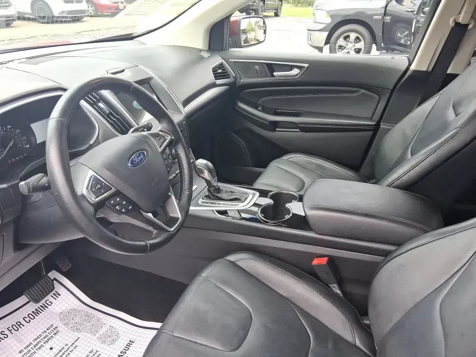 2016 Ford Edge Titanium (2FMPK3K91GB) with an 2.0L L4 DOHC 16V engine, 6A transmission, located at 4508 South Dixie Dr, Moraine, OH, 45439, (937) 908-9800, 39.689976, -84.218452 - Picture your next Ohio weekend: loading up groceries for the week in Moraine, grabbing coffee off South Dixie Drive, then cruising I-75 toward Dayton's Riverscape MetroPark or a quick family road trip to Carillon Historical Park-without feeling cramped, stressed, or under-equipped. This **2016 Ford - Photo#9