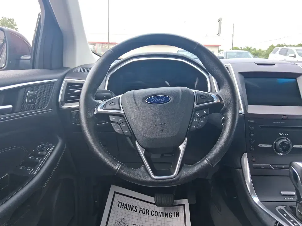 2016 Ford Edge Titanium (2FMPK3K91GB) with an 2.0L L4 DOHC 16V engine, 6A transmission, located at 4508 South Dixie Dr, Moraine, OH, 45439, (937) 908-9800, 39.689976, -84.218452 - Picture your next Ohio weekend: loading up groceries for the week in Moraine, grabbing coffee off South Dixie Drive, then cruising I-75 toward Dayton's Riverscape MetroPark or a quick family road trip to Carillon Historical Park-without feeling cramped, stressed, or under-equipped. This **2016 Ford - Photo#17