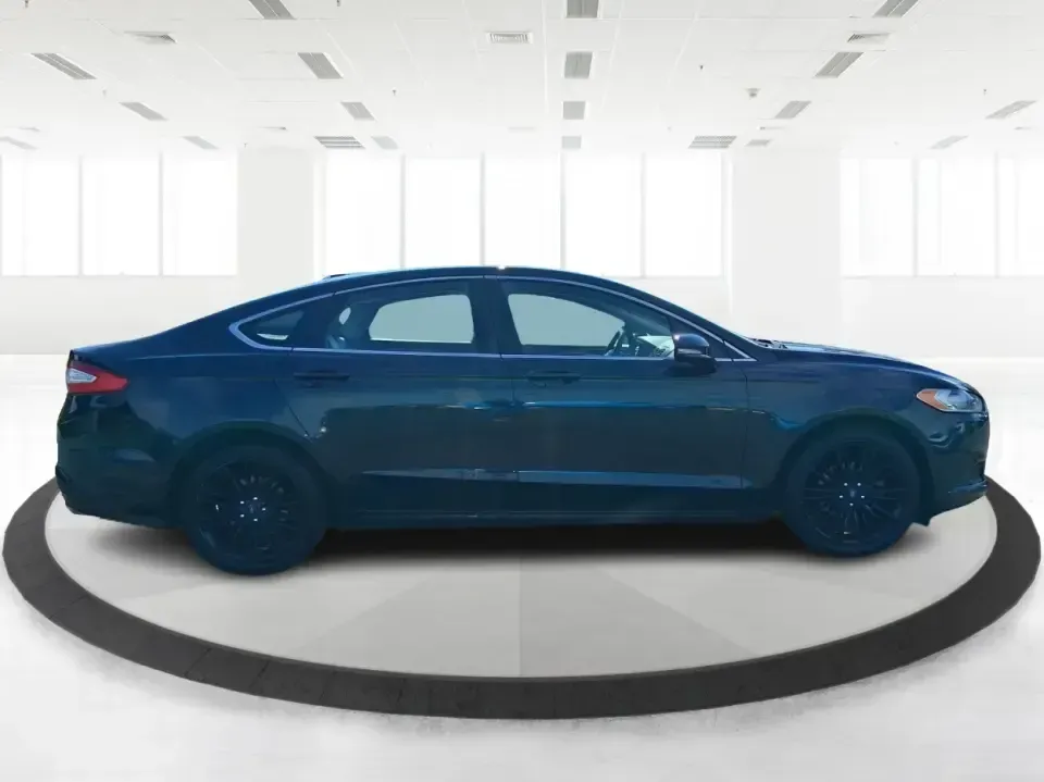 2014 Ford Fusion SE (3FA6P0HD8ER) with an 1.5L L4 DOHC 16V engine, located at 1099 N County Rd 25A, Troy, OH, 45373, (937) 908-9800, 40.057079, -84.212883 - Need a dependable commuter that still feels comfortable for date night in Beavercreek, errands around Xenia Station, and weekend drives out toward Caesars Creek? This 2014 Ford Fusion SE is the kind of smart, budget-friendly sedan that fits real life-easy to park downtown, smooth on longer stretches - Photo#1
