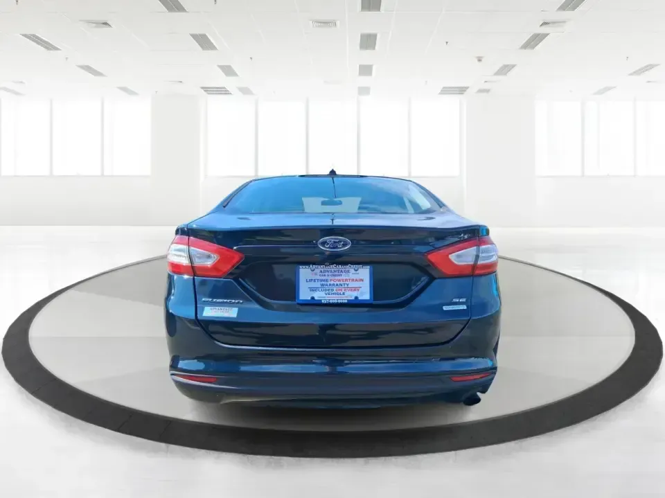 2014 Ford Fusion SE (3FA6P0HD8ER) with an 1.5L L4 DOHC 16V engine, located at 1099 N County Rd 25A, Troy, OH, 45373, (937) 908-9800, 40.057079, -84.212883 - Need a dependable commuter that still feels comfortable for date night in Beavercreek, errands around Xenia Station, and weekend drives out toward Caesars Creek? This 2014 Ford Fusion SE is the kind of smart, budget-friendly sedan that fits real life-easy to park downtown, smooth on longer stretches - Photo#3