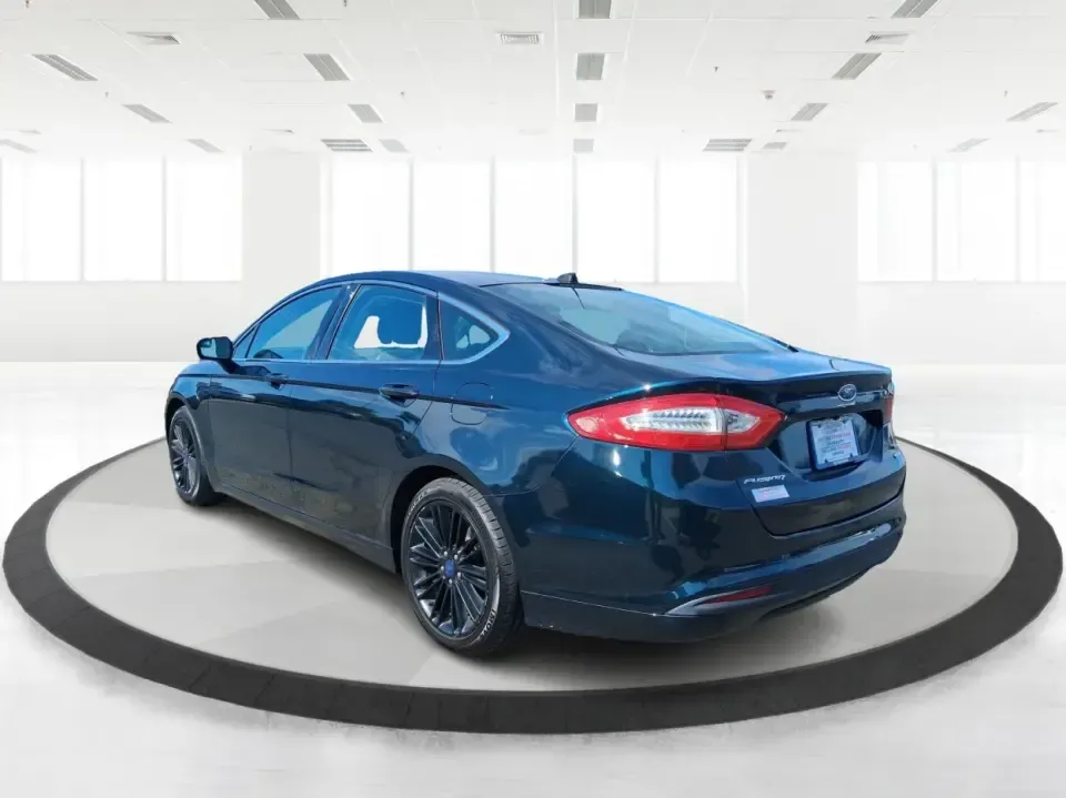 2014 Ford Fusion SE (3FA6P0HD8ER) with an 1.5L L4 DOHC 16V engine, located at 1099 N County Rd 25A, Troy, OH, 45373, (937) 908-9800, 40.057079, -84.212883 - Need a dependable commuter that still feels comfortable for date night in Beavercreek, errands around Xenia Station, and weekend drives out toward Caesars Creek? This 2014 Ford Fusion SE is the kind of smart, budget-friendly sedan that fits real life-easy to park downtown, smooth on longer stretches - Photo#4