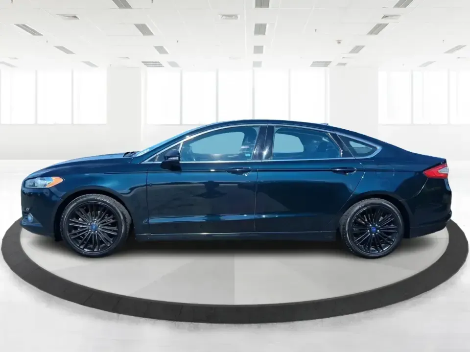 2014 Ford Fusion SE (3FA6P0HD8ER) with an 1.5L L4 DOHC 16V engine, located at 1099 N County Rd 25A, Troy, OH, 45373, (937) 908-9800, 40.057079, -84.212883 - Need a dependable commuter that still feels comfortable for date night in Beavercreek, errands around Xenia Station, and weekend drives out toward Caesars Creek? This 2014 Ford Fusion SE is the kind of smart, budget-friendly sedan that fits real life-easy to park downtown, smooth on longer stretches - Photo#5