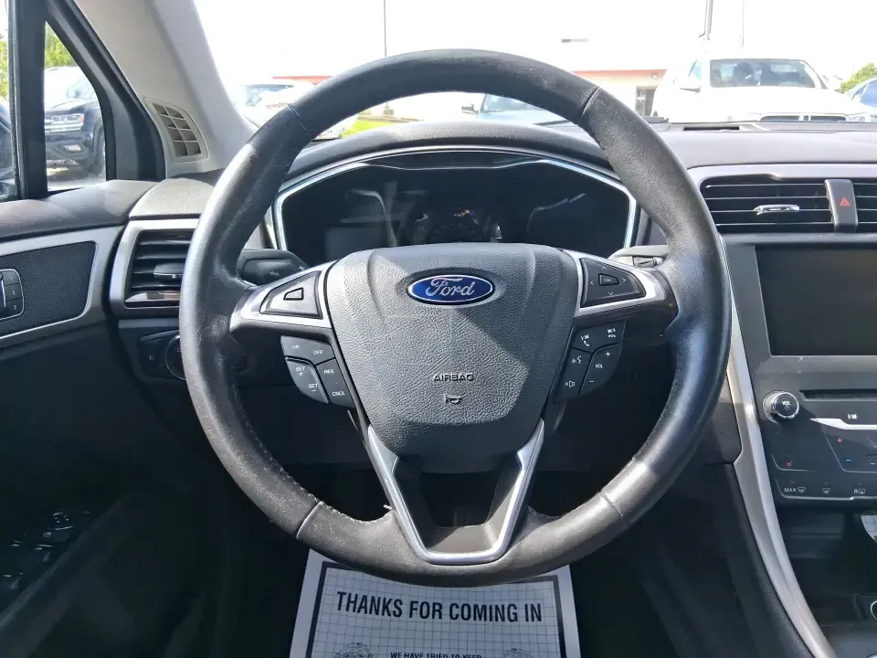 2014 Ford Fusion SE (3FA6P0HD8ER) with an 1.5L L4 DOHC 16V engine, located at 1099 N County Rd 25A, Troy, OH, 45373, (937) 908-9800, 40.057079, -84.212883 - Need a dependable commuter that still feels comfortable for date night in Beavercreek, errands around Xenia Station, and weekend drives out toward Caesars Creek? This 2014 Ford Fusion SE is the kind of smart, budget-friendly sedan that fits real life-easy to park downtown, smooth on longer stretches - Photo#16