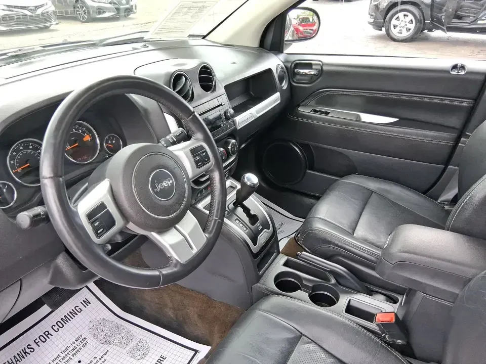2017 Jeep Compass High Altitude FWD (1C4NJCEBXHD) with an 2.4L L4 DOHC 16V engine, CVT transmission, located at 1951 S Dayton Lakeview Rd., New Carlisle, OH, 45344, (937) 908-9800, 39.890999, -84.050255 - Picture your next week looking simpler: a comfortable SUV for the daily commute down I70, school drop-offs, and spontaneous Saturday drives to Buck Creek State Park-without feeling like you have to put your life on hold while you shop for financing. This 2017 Jeep Compass High Altitude FWD in Black - Photo#9