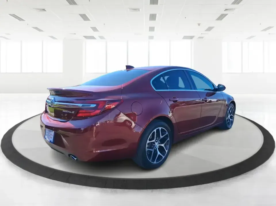 2017 Buick Regal Turbo Sport Touring (2G4GL5EX9H9) with an 2L I-4 gasoline direct injection engine, 6A transmission, located at 1099 N County Rd 25A, Troy, OH, 45373, (937) 908-9800, 40.057079, -84.212883 - Need a sporty, comfortable commuter that still feels special on date night, errands around town, or a weekend run up I75? This 2017 Buick Regal Turbo Sport Touring in Crimson Red Tintcoat fits the lifestyle of drivers who want a refined sedan with confident power for daily miles, plus the kind of fe - Photo#2