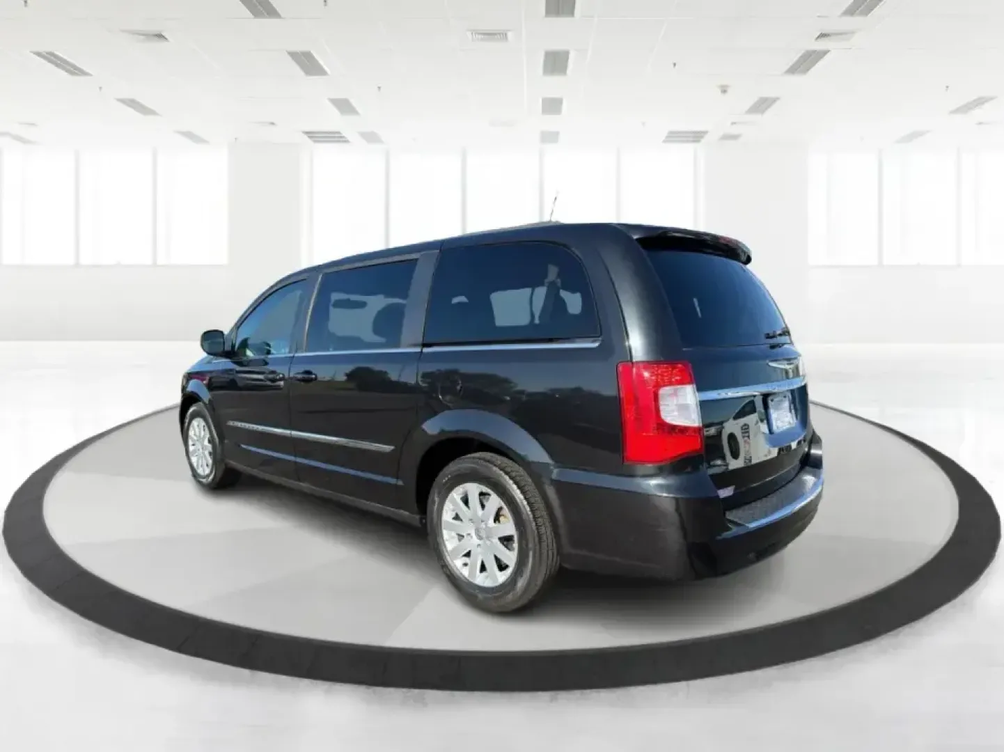 2013 Chrysler Town and Country Touring (2C4RC1BG8DR) with an Pentastar 3.6L V-6 DOHC engine, 6-Speed Automatic transmission, located at 8750 N County Rd 25A, Piqua, OH, 45356, (937) 908-9800, 40.164391, -84.232513 - Road-trip weekends, school drop-offs, and big-box store runs feel a lot easier when you've got a minivan that's built for real life. This 2013 Chrysler Town and Country Touring in Brilliant Black Crystal Pearlcoat is a smart pick for growing families, busy commuters, and budget-conscious buyers wh - Photo#4