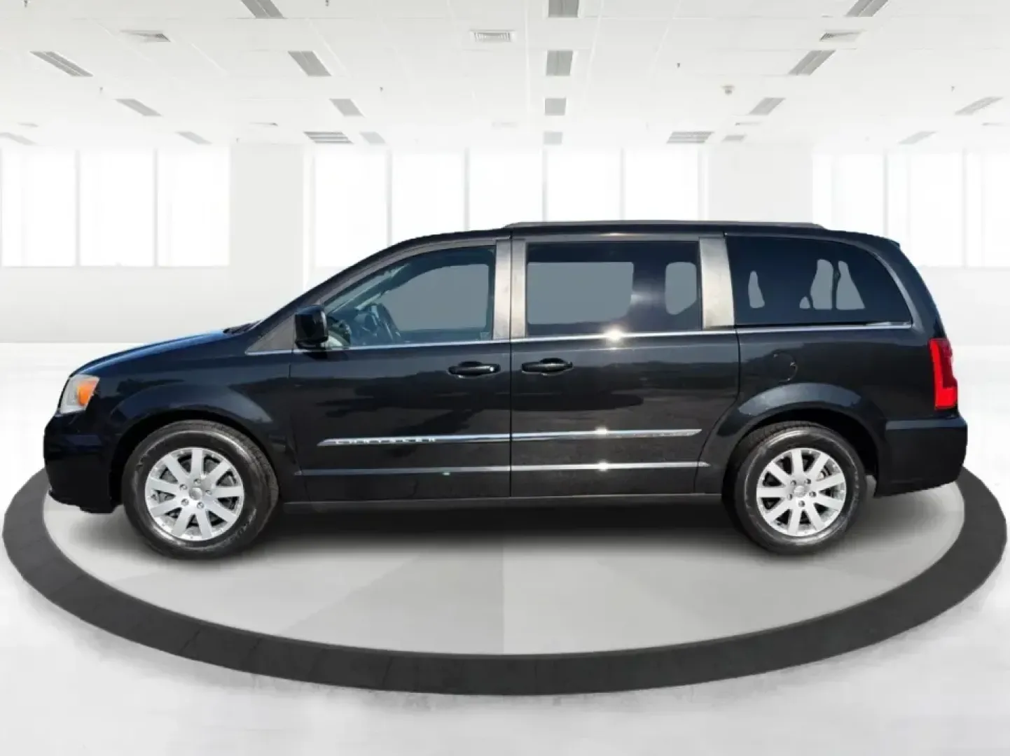 2013 Chrysler Town and Country Touring (2C4RC1BG8DR) with an Pentastar 3.6L V-6 DOHC engine, 6-Speed Automatic transmission, located at 8750 N County Rd 25A, Piqua, OH, 45356, (937) 908-9800, 40.164391, -84.232513 - Road-trip weekends, school drop-offs, and big-box store runs feel a lot easier when you've got a minivan that's built for real life. This 2013 Chrysler Town and Country Touring in Brilliant Black Crystal Pearlcoat is a smart pick for growing families, busy commuters, and budget-conscious buyers wh - Photo#5