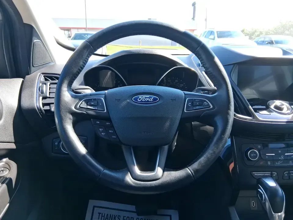 2019 Ford Escape Titanium (1FMCU9J9XKU) with an EcoBoost 2L I-4 gasoline direct injection engine, 6A transmission, located at 8750 N County Rd 25A, Piqua, OH, 45356, (937) 908-9800, 40.164391, -84.232513 - Pack up the kids, load the groceries, or point the hood toward a weekend getaway-this 2019 Ford Escape Titanium 4WD is built for real life in West Central Ohio, where commutes, school drop-offs, and quick trips up I75 all happen in the same week. With an upscale Titanium cabin and confident all-weat - Photo#16