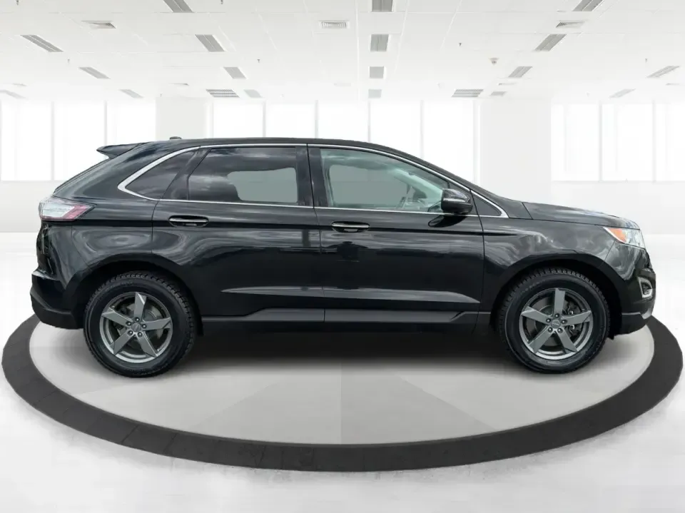 2015 Ford Edge Titanium (2FMTK4K82FB) with an 3.5L V6 DOHC 24V engine, 6-Speed Automatic transmission, located at 1184 Kauffman Ave, Fairborn, OH, 45324, (937) 908-9800, 39.807072, -84.030914 - Need a comfortable, confident SUV for Dayton-area commuting, school drop-offs, and spontaneous weekend getaways to Yellow Springs? This 2015 Ford Edge Titanium in Tuxedo Black Metallic blends everyday practicality with upscale features, giving you a road-trip-ready ride that fits a busy life in Fair - Photo#1