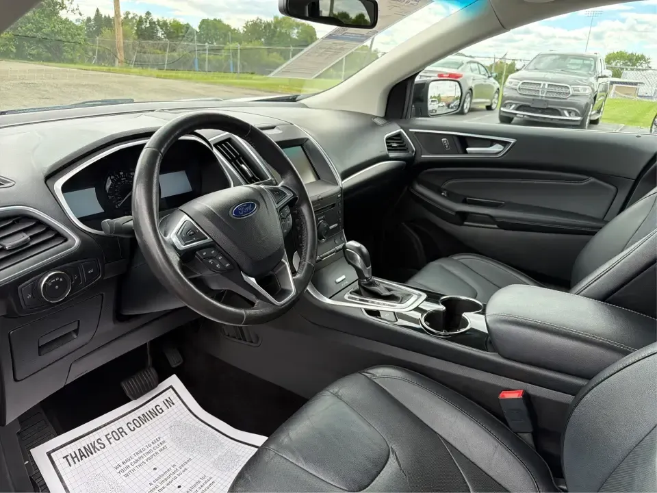 2015 Ford Edge Titanium (2FMTK4K82FB) with an 3.5L V6 DOHC 24V engine, 6-Speed Automatic transmission, located at 1184 Kauffman Ave, Fairborn, OH, 45324, (937) 908-9800, 39.807072, -84.030914 - Need a comfortable, confident SUV for Dayton-area commuting, school drop-offs, and spontaneous weekend getaways to Yellow Springs? This 2015 Ford Edge Titanium in Tuxedo Black Metallic blends everyday practicality with upscale features, giving you a road-trip-ready ride that fits a busy life in Fair - Photo#9