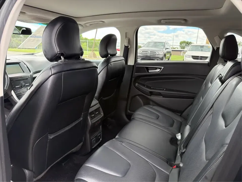2015 Ford Edge Titanium (2FMTK4K82FB) with an 3.5L V6 DOHC 24V engine, 6-Speed Automatic transmission, located at 1184 Kauffman Ave, Fairborn, OH, 45324, (937) 908-9800, 39.807072, -84.030914 - Need a comfortable, confident SUV for Dayton-area commuting, school drop-offs, and spontaneous weekend getaways to Yellow Springs? This 2015 Ford Edge Titanium in Tuxedo Black Metallic blends everyday practicality with upscale features, giving you a road-trip-ready ride that fits a busy life in Fair - Photo#10