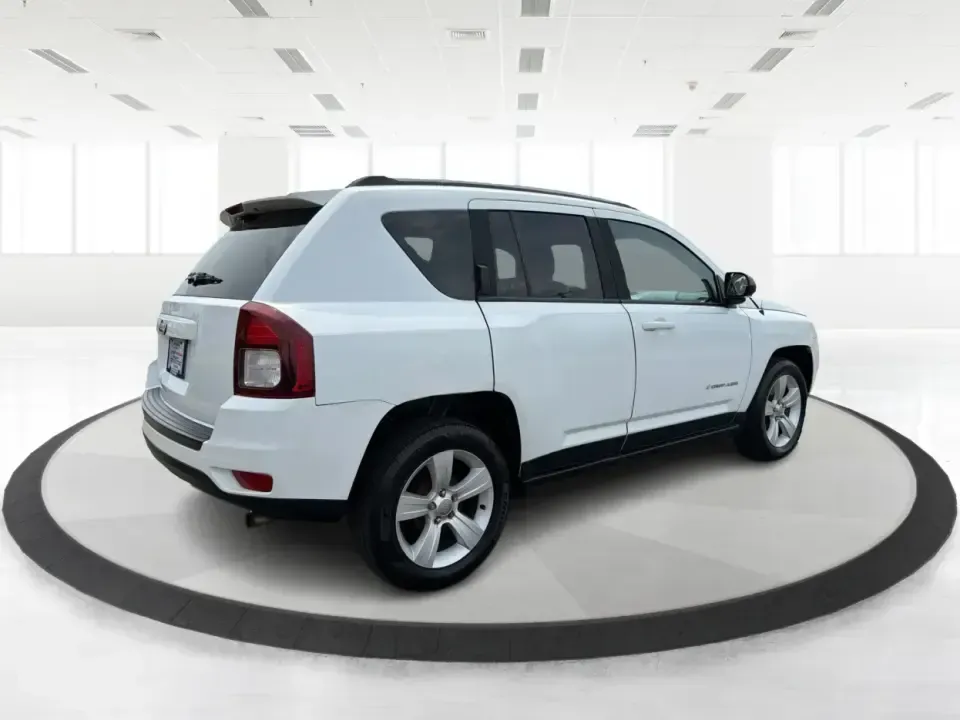 2016 Jeep Compass Sport (1C4NJCBA1GD) with an 2.0L L4 DOHC 16V engine, Automatic transmission, located at 4508 South Dixie Dr, Moraine, OH, 45439, (937) 908-9800, 39.689976, -84.218452 - **Adventure Awaits with the 2016 Jeep Compass Sport in Fairborn, OH!**<br /> <br /> Are you and your family ready to embark on thrilling weekend adventures or find the ideal companion for your daily commute? Look no further! The 2016 Jeep Compass Sport is the perfect SUV for those who need a dependa - Photo#2