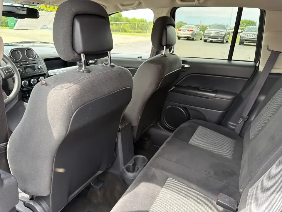 2016 Jeep Compass Sport (1C4NJCBA1GD) with an 2.0L L4 DOHC 16V engine, Automatic transmission, located at 4508 South Dixie Dr, Moraine, OH, 45439, (937) 908-9800, 39.689976, -84.218452 - **Adventure Awaits with the 2016 Jeep Compass Sport in Fairborn, OH!**<br /> <br /> Are you and your family ready to embark on thrilling weekend adventures or find the ideal companion for your daily commute? Look no further! The 2016 Jeep Compass Sport is the perfect SUV for those who need a dependa - Photo#10