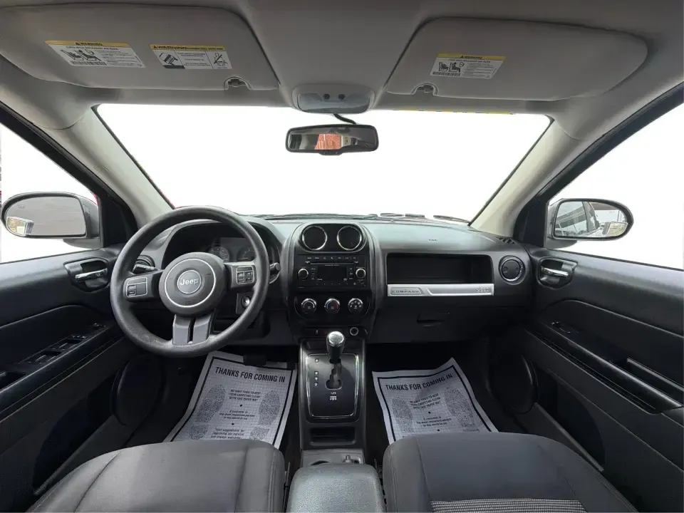 2016 Jeep Compass Sport (1C4NJCBA1GD) with an 2.0L L4 DOHC 16V engine, Automatic transmission, located at 4508 South Dixie Dr, Moraine, OH, 45439, (937) 908-9800, 39.689976, -84.218452 - **Adventure Awaits with the 2016 Jeep Compass Sport in Fairborn, OH!**<br /> <br /> Are you and your family ready to embark on thrilling weekend adventures or find the ideal companion for your daily commute? Look no further! The 2016 Jeep Compass Sport is the perfect SUV for those who need a dependa - Photo#20