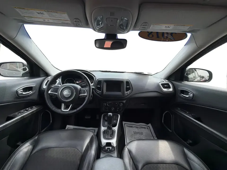 2018 Jeep Compass Latitude 4x4 (3C4NJDBB6JT) with an 2.4L L4 DOHC 16V engine, Manual/Standard transmission, located at 1099 N County Rd 25A, Troy, OH, 45373, (937) 908-9800, 40.057079, -84.212883 - Ready for weekend escapes to Hocking Hills, snowy school drop-offs, or a daily commute down I75? This 2018 Jeep Compass Latitude 4x4 is built for drivers who want SUV versatility with confident 4WD capability-great for growing families, outdoor-minded couples, and commuters who prefer a hands-on dri - Photo#21