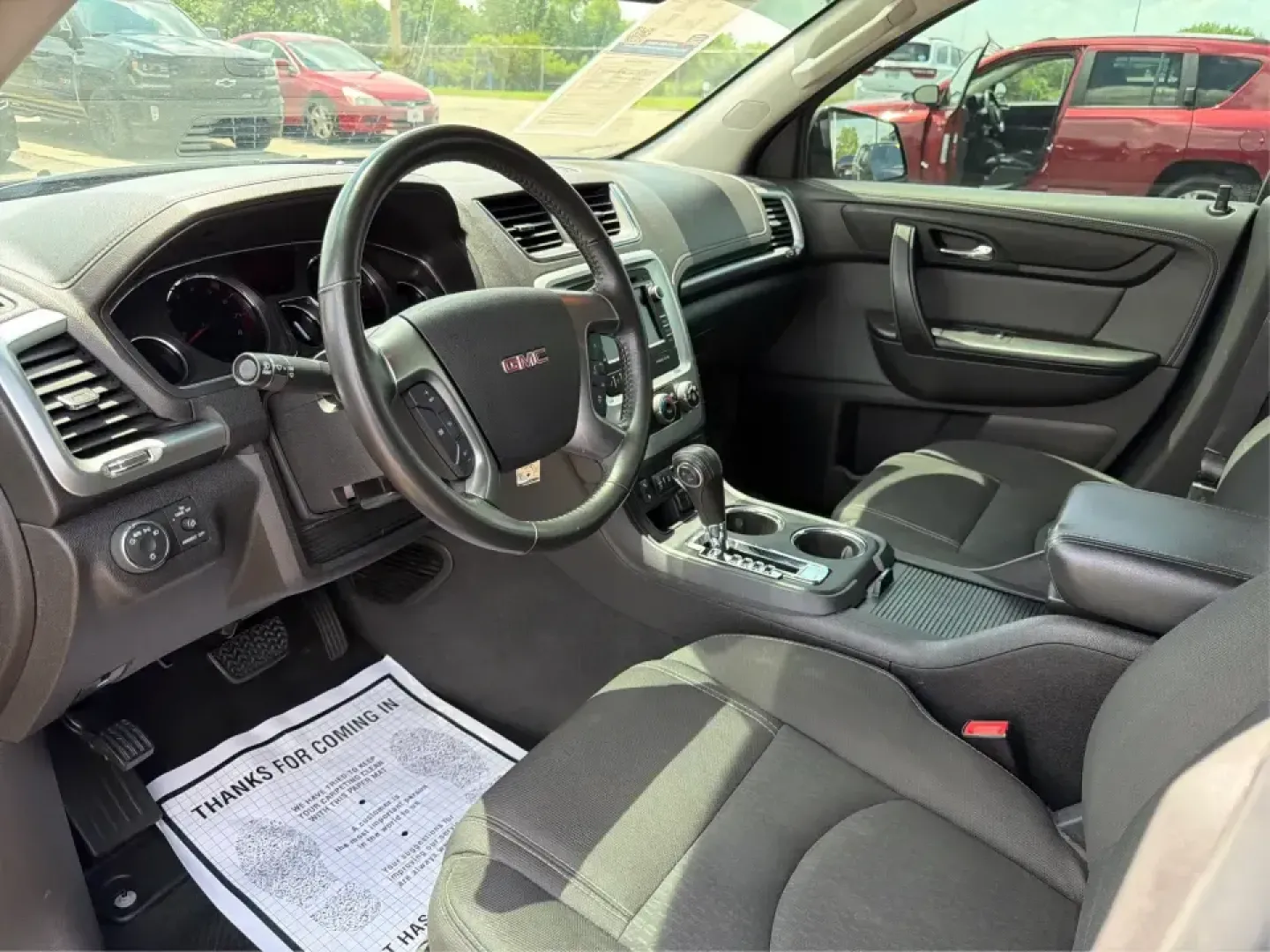 2016 GMC Acadia SLE-2 (1GKKVPKD1GJ) with an 3.6L V-6 gasoline direct injection engine, 6A transmission, located at 401 Woodman Dr, Riverside, OH, 45431, (937) 908-9800, 39.760899, -84.123421 - Need one SUV that can handle school drop-offs, long commutes, and weekend getaways to the MetroParks without feeling cramped? This 2016 GMC Acadia SLE-2 in Ebony Twilight Metallic is a smart fit for busy families and active drivers who want three-row flexibility, confident traction, and everyday com- Photo#9
