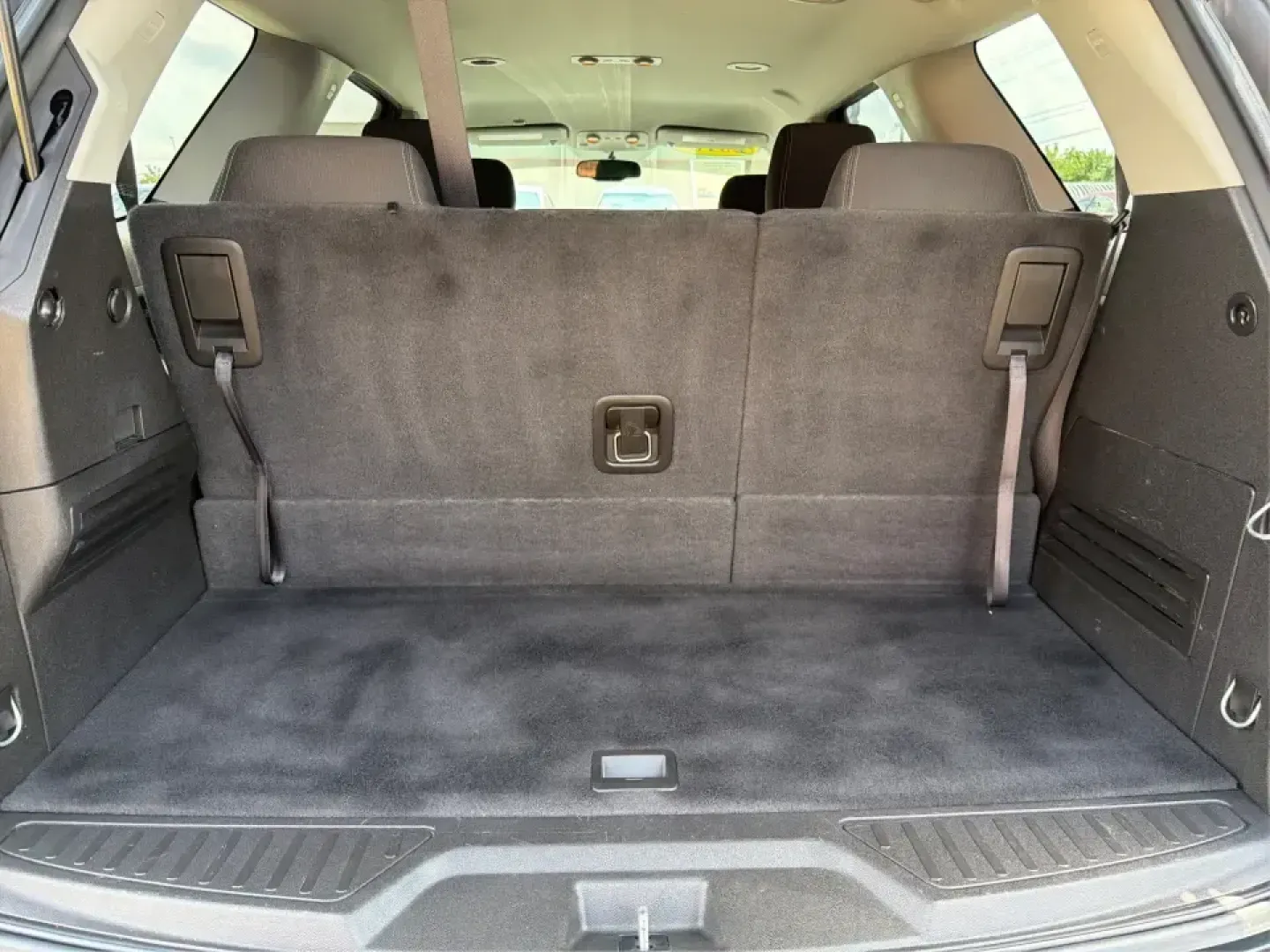 2016 GMC Acadia SLE-2 (1GKKVPKD1GJ) with an 3.6L V-6 gasoline direct injection engine, 6A transmission, located at 401 Woodman Dr, Riverside, OH, 45431, (937) 908-9800, 39.760899, -84.123421 - Need one SUV that can handle school drop-offs, long commutes, and weekend getaways to the MetroParks without feeling cramped? This 2016 GMC Acadia SLE-2 in Ebony Twilight Metallic is a smart fit for busy families and active drivers who want three-row flexibility, confident traction, and everyday com- Photo#11