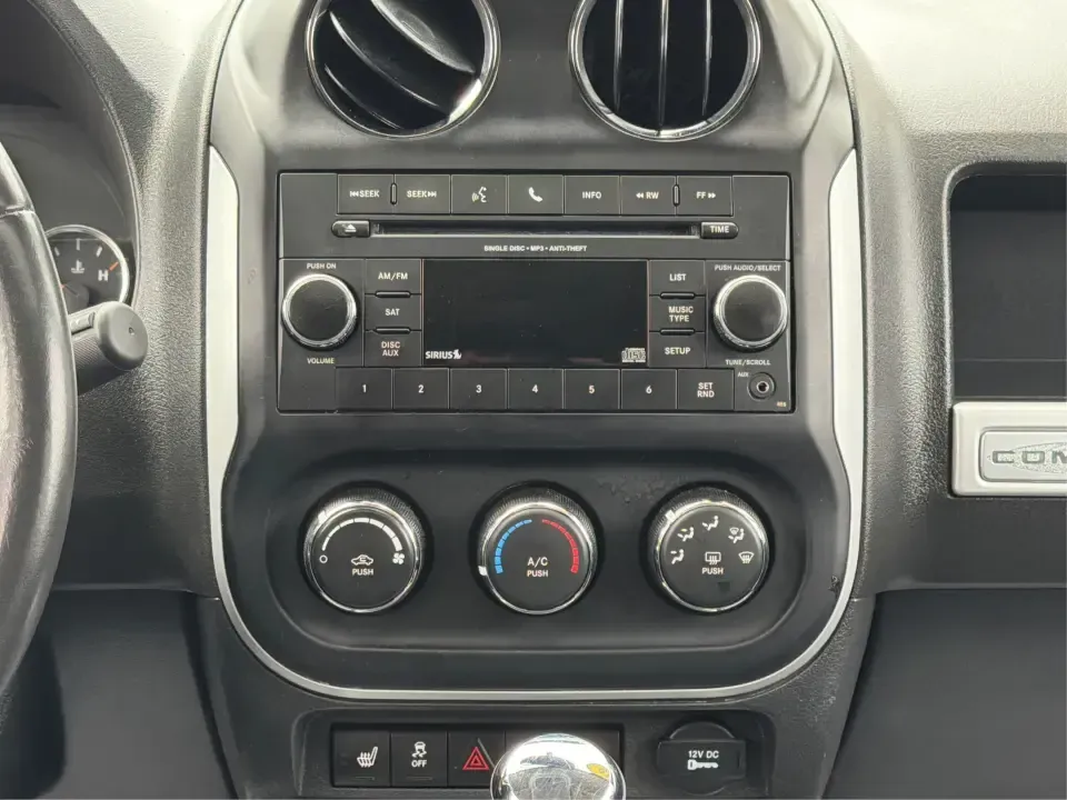 2016 Jeep Compass High Altitude Edition (1C4NJDEB2GD) with an 2.4L I-4 DOHC engine, 6A transmission, located at 8750 N County Rd 25A, Piqua, OH, 45356, (937) 908-9800, 40.164391, -84.232513 - Need a compact SUV that can handle Ohio weather, weekday commutes, and spontaneous weekend escapes without feeling bulky? This **2016 Jeep Compass High Altitude Edition 4WD** fits that lifestyle well-easy to park for errands around town, confident on wet back roads, and comfortable for longer drives - Photo#13