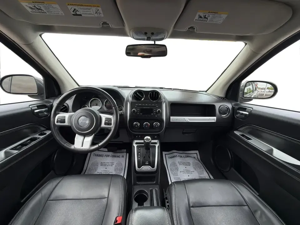 2016 Jeep Compass High Altitude Edition (1C4NJDEB2GD) with an 2.4L I-4 DOHC engine, 6A transmission, located at 8750 N County Rd 25A, Piqua, OH, 45356, (937) 908-9800, 40.164391, -84.232513 - Need a compact SUV that can handle Ohio weather, weekday commutes, and spontaneous weekend escapes without feeling bulky? This **2016 Jeep Compass High Altitude Edition 4WD** fits that lifestyle well-easy to park for errands around town, confident on wet back roads, and comfortable for longer drives - Photo#20