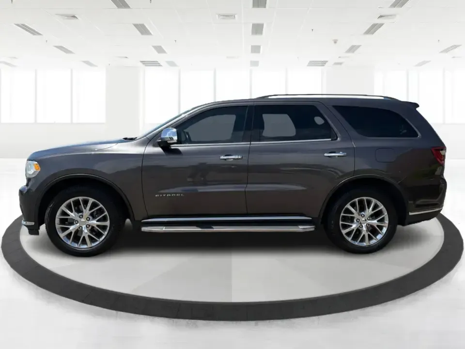 2014 Dodge Durango Citadel (1C4RDJEG5EC) with an 3.6L V6 DOHC 24V engine, 8-Speed Automatic transmission, located at 1099 N County Rd 25A, Troy, OH, 45373, (937) 908-9800, 40.057079, -84.212883 - Load up the family, point the nose toward I75, and turn everyday errands into comfortable road trips-this 2014 Dodge Durango Citadel is built for drivers who want three-row versatility, confident traction, and premium features without stepping into a brand-new payment. Whether you're commuting acros - Photo#5