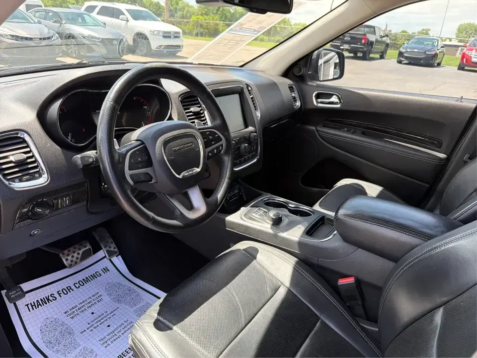 2014 Dodge Durango Citadel (1C4RDJEG5EC) with an 3.6L V6 DOHC 24V engine, 8-Speed Automatic transmission, located at 1099 N County Rd 25A, Troy, OH, 45373, (937) 908-9800, 40.057079, -84.212883 - Load up the family, point the nose toward I75, and turn everyday errands into comfortable road trips-this 2014 Dodge Durango Citadel is built for drivers who want three-row versatility, confident traction, and premium features without stepping into a brand-new payment. Whether you're commuting acros - Photo#9