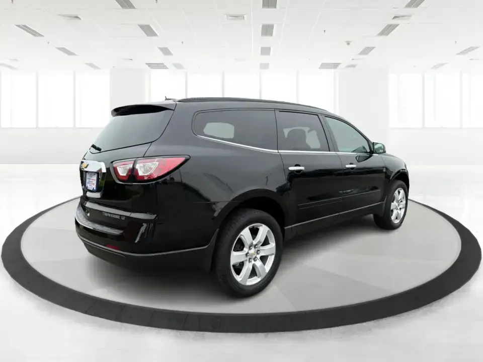 2016 Chevrolet Traverse 1LT (1GNKRGKD1GJ) with an 3.6L V-6 gasoline direct injection engine, 6A transmission, located at 8750 N County Rd 25A, Piqua, OH, 45356, (937) 908-9800, 40.164391, -84.232513 - Load up the kids, the cooler, and the weekend plans-this 2016 Chevrolet Traverse 1LT is the kind of family-ready SUV that makes school runs, long commutes, and Ohio road trips feel simpler. With three-row flexibility, a confident 3.6L V6, and everyday comfort features, it's a smart pick for growing - Photo#2