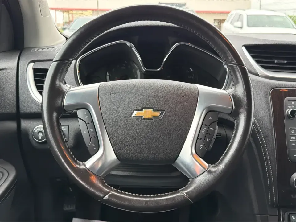 2016 Chevrolet Traverse 1LT (1GNKRGKD1GJ) with an 3.6L V-6 gasoline direct injection engine, 6A transmission, located at 8750 N County Rd 25A, Piqua, OH, 45356, (937) 908-9800, 40.164391, -84.232513 - Load up the kids, the cooler, and the weekend plans-this 2016 Chevrolet Traverse 1LT is the kind of family-ready SUV that makes school runs, long commutes, and Ohio road trips feel simpler. With three-row flexibility, a confident 3.6L V6, and everyday comfort features, it's a smart pick for growing - Photo#16