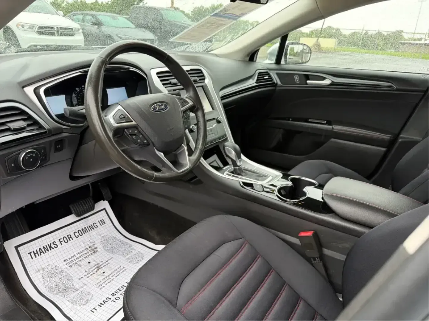 2014 Ford Fusion SE (3FA6P0H90ER) with an 2.0L L4 DOHC 16V engine, located at 1951 S Dayton Lakeview Rd., New Carlisle, OH, 45344, (937) 908-9800, 39.890999, -84.050255 - Picture your next week: smooth commutes down I70, quick errands to Kroger, and a comfortable weekend drive to Dayton or Springfield-without driving something that feels bare-bones. This 2014 Ford Fusion SE in Ingot Silver Metallic fits real life in New Carlisle, Ohio, with the kind of practical comf- Photo#9