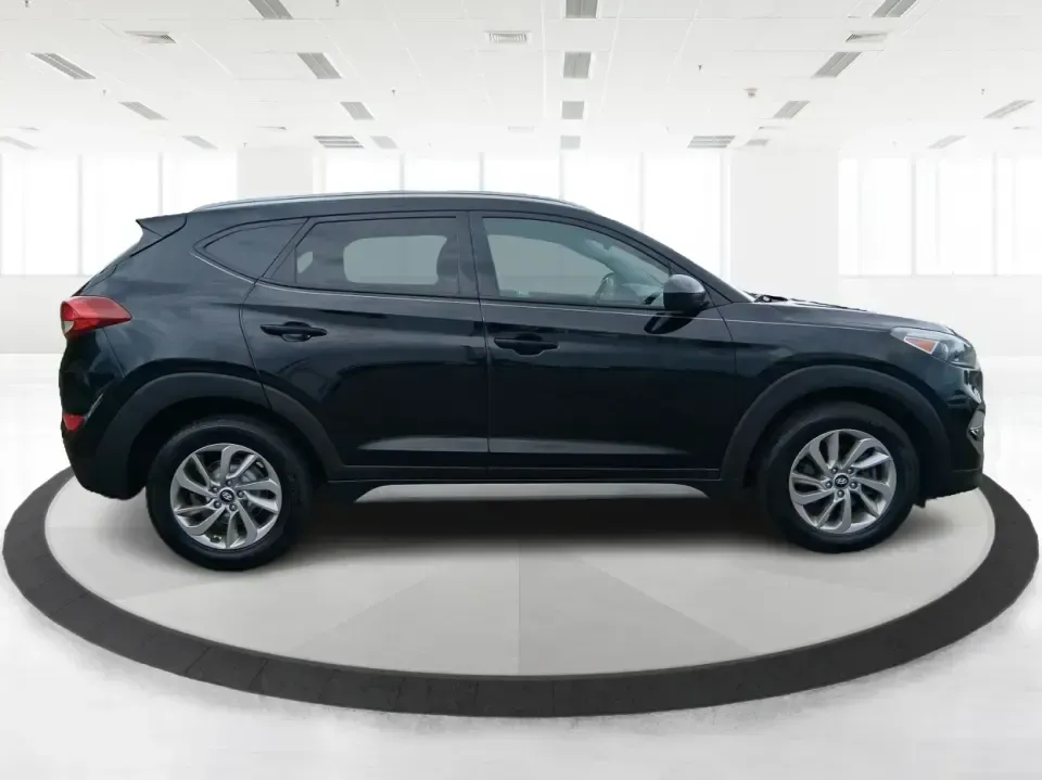 2018 Hyundai Tucson SEL (KM8J33A41JU) with an Nu 2L I-4 gasoline direct injection engine, 6A transmission, located at 880 E. National Road, Vandalia, OH, 45377, (937) 908-9800, 39.891918, -84.183594 - Picture your next week: an easy school drop-off, a smooth commute down US-35, and a weekend escape to Caesar Creek with enough room for coolers, strollers, or hiking gear. This 2018 Hyundai Tucson SEL is the kind of compact SUV that fits real life in Xenia-practical for growing families, comfortable - Photo#1