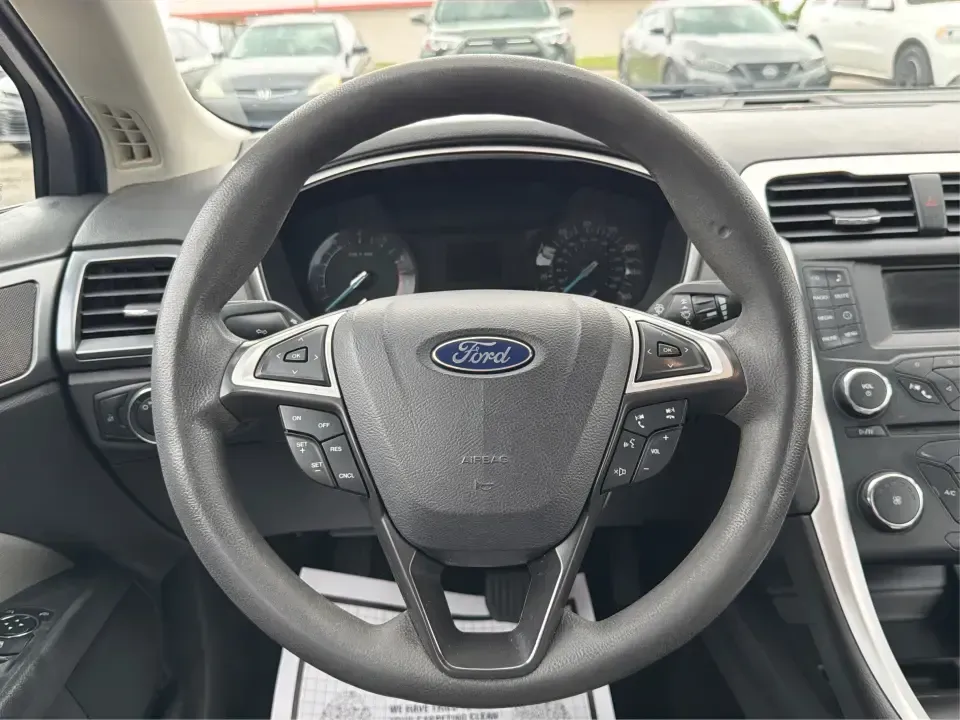 2014 Ford Fusion S (3FA6P0G78ER) with an Duratec 2.5L I-4 DOHC engine, Automatic transmission, located at 8750 N County Rd 25A, Piqua, OH, 45356, (937) 908-9800, 40.164391, -84.232513 - Are you on the hunt for a reliable sedan that fits seamlessly into your everyday life? Look no further than this stunning 2014 Ford Fusion S, available now at Advantage Car and Credit in Fairborn, OH. This vehicle is the perfect choice for budget-conscious buyers or families needing a dependable rid - Photo#16