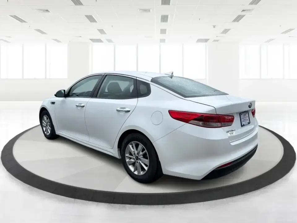 2016 Kia Optima LX (KNAGT4L36G5) with an Theta II 2.4L I-4 gasoline direct injection engine, 6A transmission, located at 401 Woodman Dr, Riverside, OH, 45431, (937) 908-9800, 39.760899, -84.123421 - Need a dependable sedan that can handle the weekday commute down I-675, quick school drop-offs near Mad River, and an easy weekend drive to Carillon Historical Park or a Dayton Dragons game? This 2016 Kia Optima LX in Snow White Pearl delivers the kind of practical comfort and modern tech that fits - Photo#4