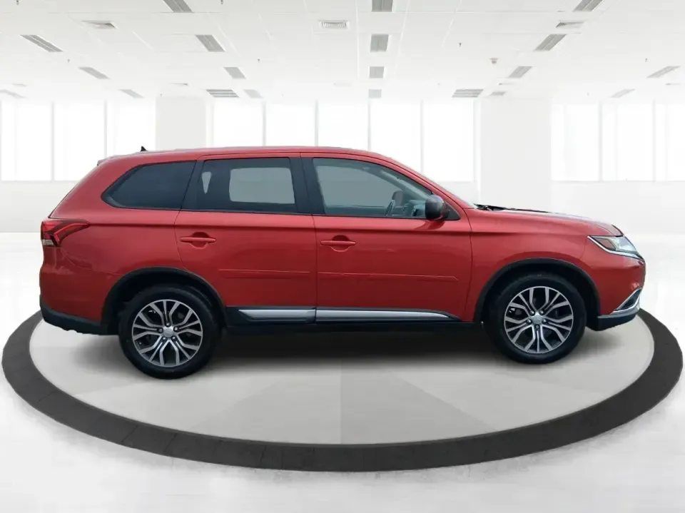 2016 Mitsubishi Outlander ES (JA4AZ3A34GZ) with an 2.4L I-4 variable valve control engine, CVT transmission, located at 401 Woodman Dr, Riverside, OH, 45431, (937) 908-9800, 39.760899, -84.123421 - Weekend getaways to Eastwood MetroPark, carpools across Riverside, and comfortable commutes down I675 feel a lot easier when you've got a versatile SUV that can flex with real life. This 2016 Mitsubishi Outlander ES in eye-catching Rally Red Metallic is built for the buyer who wants space, capabilit - Photo#1