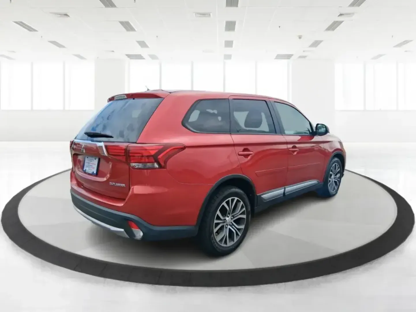 2016 Mitsubishi Outlander ES (JA4AZ3A34GZ) with an 2.4L I-4 variable valve control engine, CVT transmission, located at 401 Woodman Dr, Riverside, OH, 45431, (937) 908-9800, 39.760899, -84.123421 - Weekend getaways to Eastwood MetroPark, carpools across Riverside, and comfortable commutes down I675 feel a lot easier when you've got a versatile SUV that can flex with real life. This 2016 Mitsubishi Outlander ES in eye-catching Rally Red Metallic is built for the buyer who wants space, capabilit- Photo#2
