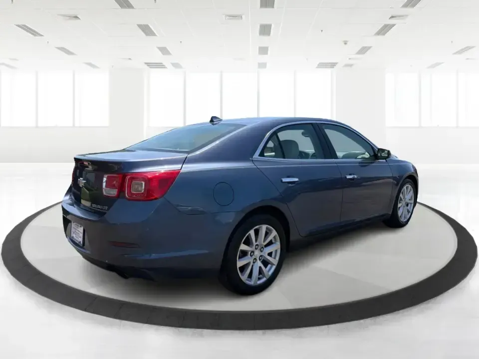 2014 Chevrolet Malibu 1LZ (1G11H5SL5EF) with an ECOTEC 2.5L I-4 gasoline direct injection engine, 6-Speed Automatic transmission, located at 401 Woodman Dr, Riverside, OH, 45431, (937) 908-9800, 39.760899, -84.123421 - Need a dependable commuter that still feels comfortable for weekend plans, errands, and date-night drives? This 2014 Chevrolet Malibu 1LZ in Atlantis Blue Metallic is a smart pick for life around New Carlisle-whether you're cruising I70 to Dayton, running quick trips down S DaytonLakeview Rd, or hea - Photo#2