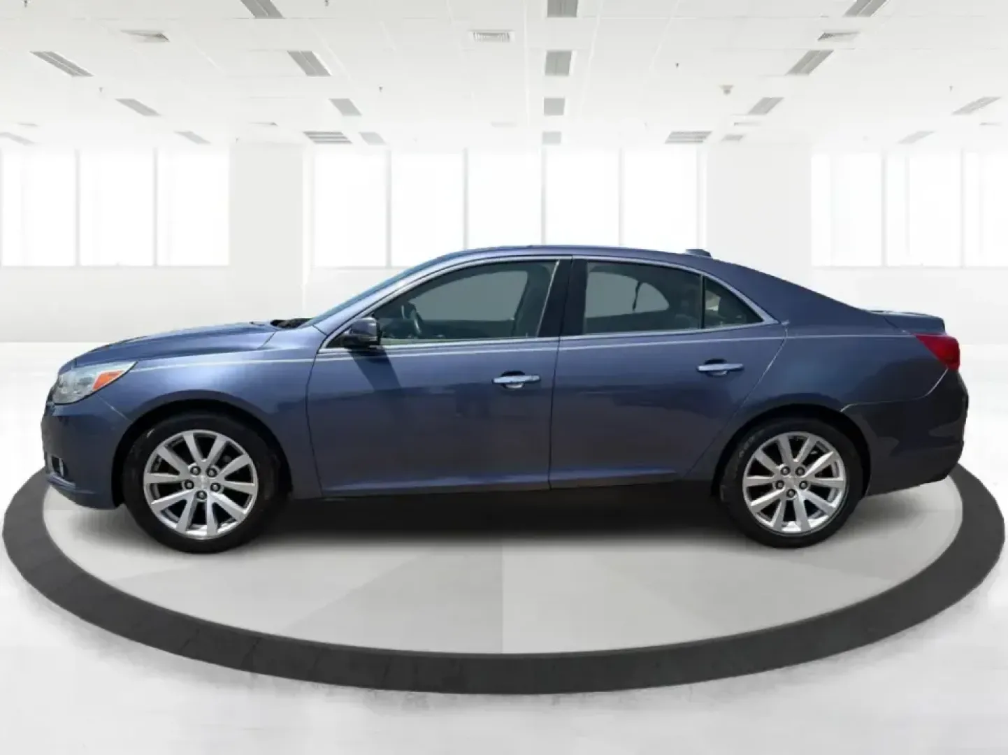 2014 Chevrolet Malibu 1TZ (1G11H5SL5EF) with an 2.5L L4 DOHC 16V engine, 6-Speed Automatic transmission, located at 401 Woodman Dr, Riverside, OH, 45431, (937) 908-9800, 39.760899, -84.123421 - Need a dependable sedan for the daily commute to Wright-Patterson AFB, quick errands down Woodman Dr, or comfortable weekend drives along I-675? This 2014 Chevrolet Malibu 1LZ in eye-catching Atlantis Blue Metallic fits real-life routines-school drop-offs, long commutes, and budget-friendly road tri - Photo#5