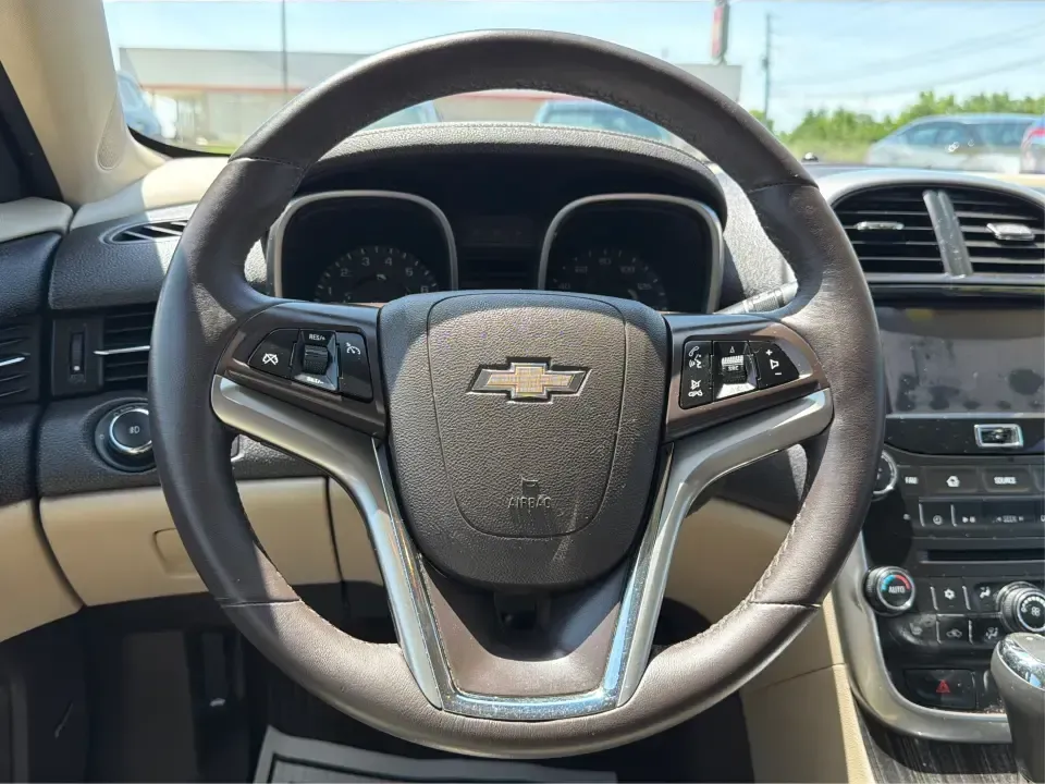 2014 Chevrolet Malibu 1LZ (1G11H5SL5EF) with an ECOTEC 2.5L I-4 gasoline direct injection engine, 6-Speed Automatic transmission, located at 401 Woodman Dr, Riverside, OH, 45431, (937) 908-9800, 39.760899, -84.123421 - Need a dependable commuter that still feels comfortable for weekend plans, errands, and date-night drives? This 2014 Chevrolet Malibu 1LZ in Atlantis Blue Metallic is a smart pick for life around New Carlisle-whether you're cruising I70 to Dayton, running quick trips down S DaytonLakeview Rd, or hea - Photo#15
