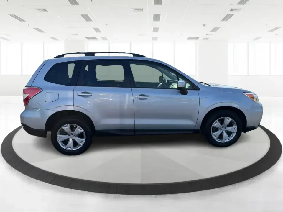 2015 Subaru Forester 2.5i Premium (JF2SJADC8FH) with an 2.5L H-4 DOHC engine, 6-Speed Automatic transmission, located at 880 E. National Road, Vandalia, OH, 45377, (937) 908-9800, 39.891918, -84.183594 - Weekend getaways to Hocking Hills, snowy commutes up I75, or everyday school-drop and grocery runs around Vandalia-this 2015 Subaru Forester 2.5i Premium is built for the kind of Ohio life that doesn't slow down when the weather changes. With Subaru practicality, a roomy hatchback-style cargo area, - Photo#1