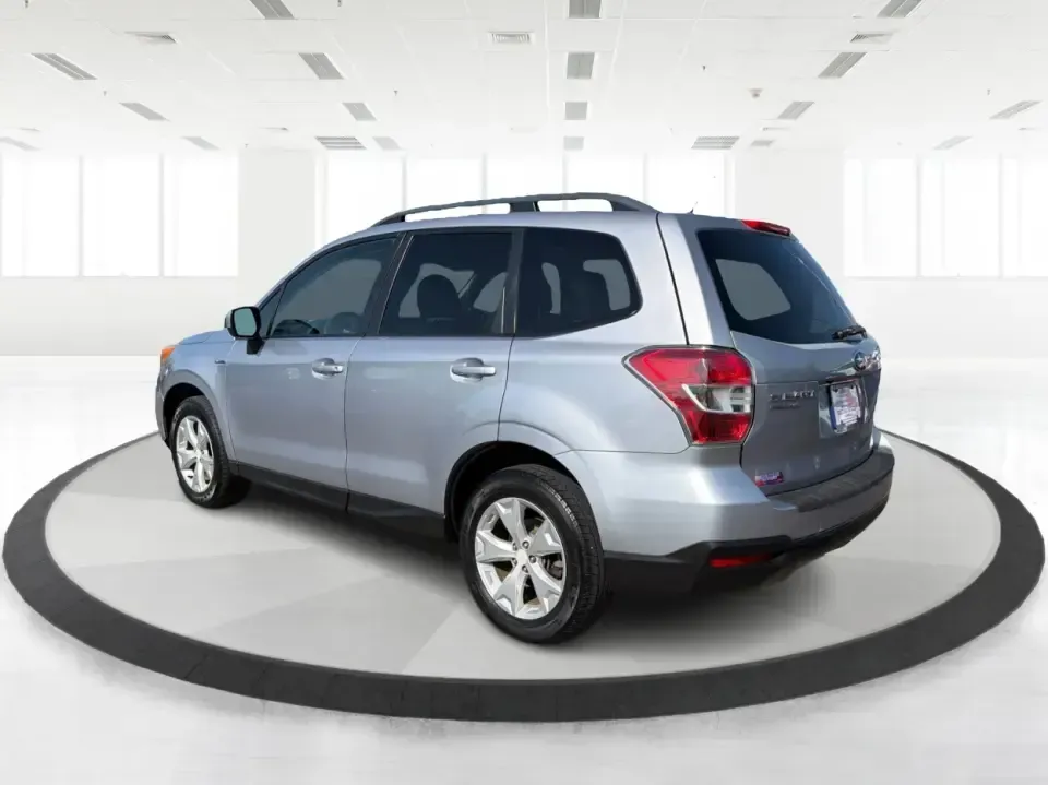 2015 Subaru Forester 2.5i Premium (JF2SJADC8FH) with an 2.5L H-4 DOHC engine, 6-Speed Automatic transmission, located at 880 E. National Road, Vandalia, OH, 45377, (937) 908-9800, 39.891918, -84.183594 - Weekend getaways to Hocking Hills, snowy commutes up I75, or everyday school-drop and grocery runs around Vandalia-this 2015 Subaru Forester 2.5i Premium is built for the kind of Ohio life that doesn't slow down when the weather changes. With Subaru practicality, a roomy hatchback-style cargo area, - Photo#4