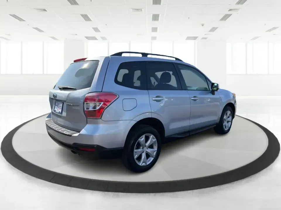 2015 Subaru Forester 2.5i Premium (JF2SJADC8FH) with an 2.5L H-4 DOHC engine, 6-Speed Automatic transmission, located at 1184 Kauffman Ave, Fairborn, OH, 45324, (937) 908-9800, 39.807072, -84.030914 - Weekend getaways to Hocking Hills, snowy commutes up I75, or everyday school-drop and grocery runs around Vandalia-this 2015 Subaru Forester 2.5i Premium is built for the kind of Ohio life that doesn't slow down when the weather changes. With Subaru practicality, a roomy hatchback-style cargo area, - Photo#2