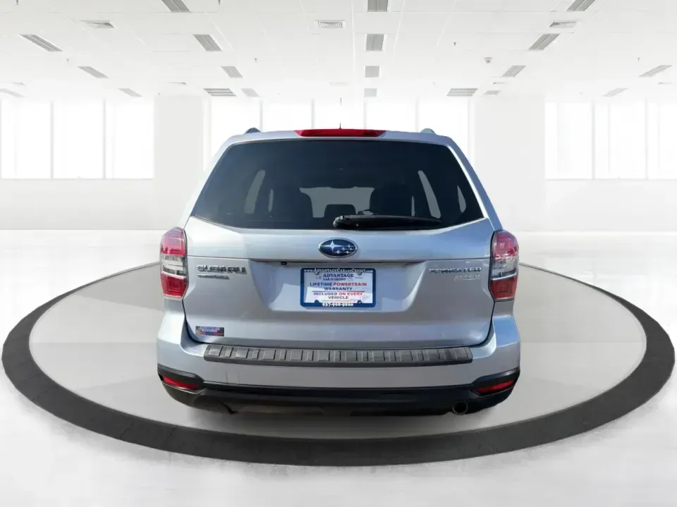2015 Subaru Forester 2.5i Premium (JF2SJADC8FH) with an 2.5L H-4 DOHC engine, 6-Speed Automatic transmission, located at 1184 Kauffman Ave, Fairborn, OH, 45324, (937) 908-9800, 39.807072, -84.030914 - Weekend getaways to Hocking Hills, snowy commutes up I75, or everyday school-drop and grocery runs around Vandalia-this 2015 Subaru Forester 2.5i Premium is built for the kind of Ohio life that doesn't slow down when the weather changes. With Subaru practicality, a roomy hatchback-style cargo area, - Photo#3