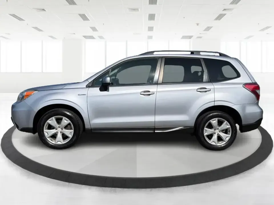 2015 Subaru Forester 2.5i Premium (JF2SJADC8FH) with an 2.5L H-4 DOHC engine, 6-Speed Automatic transmission, located at 1184 Kauffman Ave, Fairborn, OH, 45324, (937) 908-9800, 39.807072, -84.030914 - Weekend getaways to Hocking Hills, snowy commutes up I75, or everyday school-drop and grocery runs around Vandalia-this 2015 Subaru Forester 2.5i Premium is built for the kind of Ohio life that doesn't slow down when the weather changes. With Subaru practicality, a roomy hatchback-style cargo area, - Photo#5